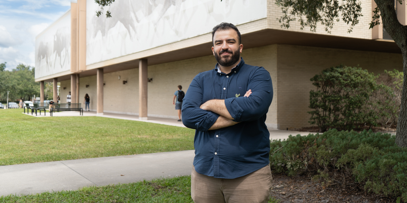 Mohamed Ebraheem standing outdoors on the USF campus